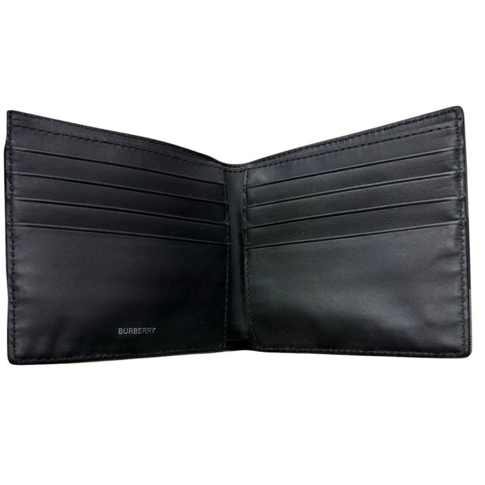 Burberry navy blue bifold wallet featuring iconic Nova Check pattern and logo.