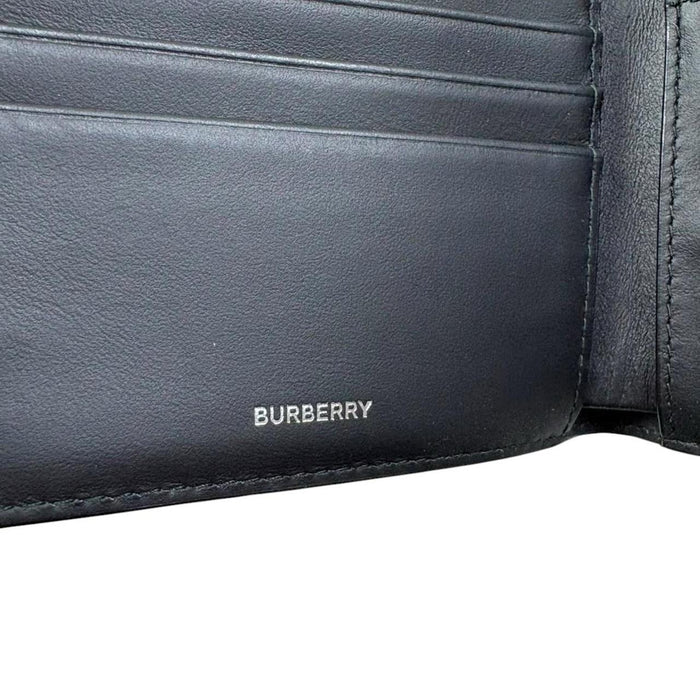 Burberry bifold wallet tan brown Nova Check pattern with logo detail.