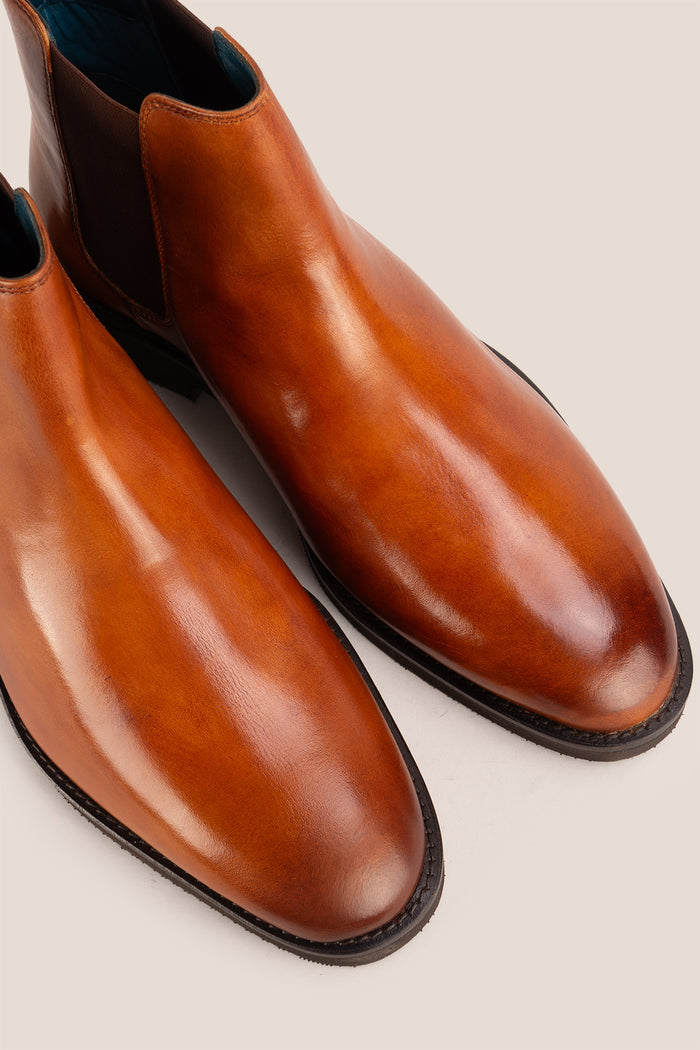 Michael tan leather Chelsea boots for men with elastic sides and pull tab, perfect for smart-casual and formal wear.