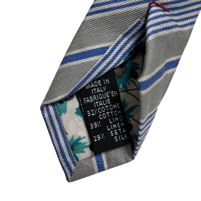 Paul Smith blue and grey striped tie in cotton/silk blend with logo detail.