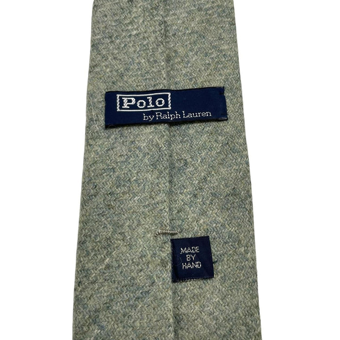 Polo Ralph Lauren green wool tie with classic logo and textured fabric.