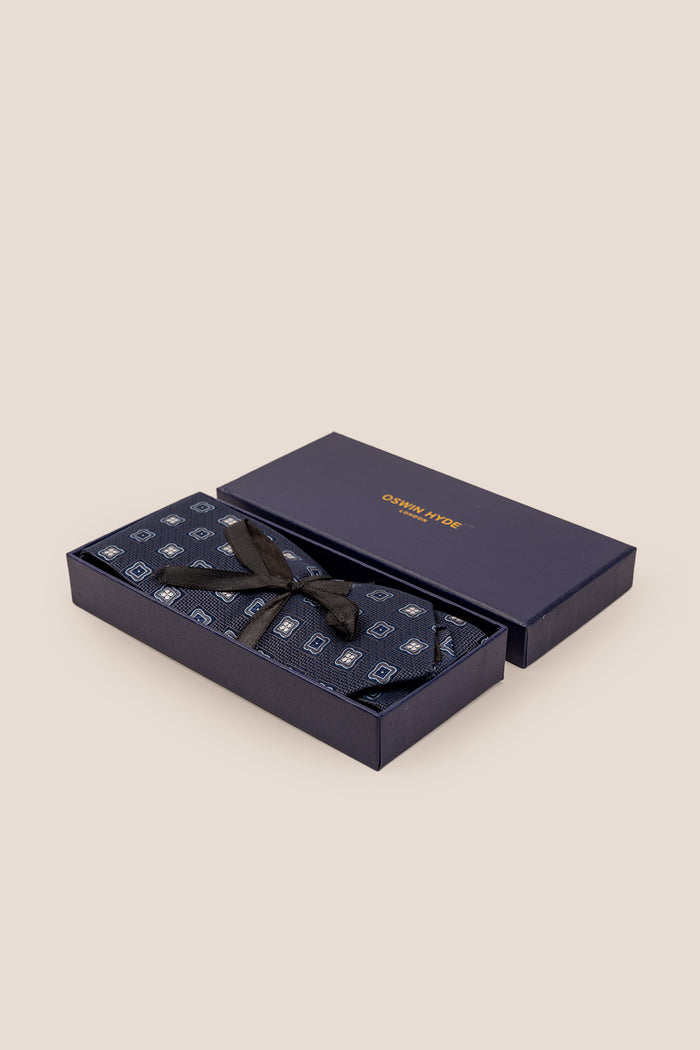 Theo Navy tie with geometric pattern, perfect for weddings and formal gatherings.