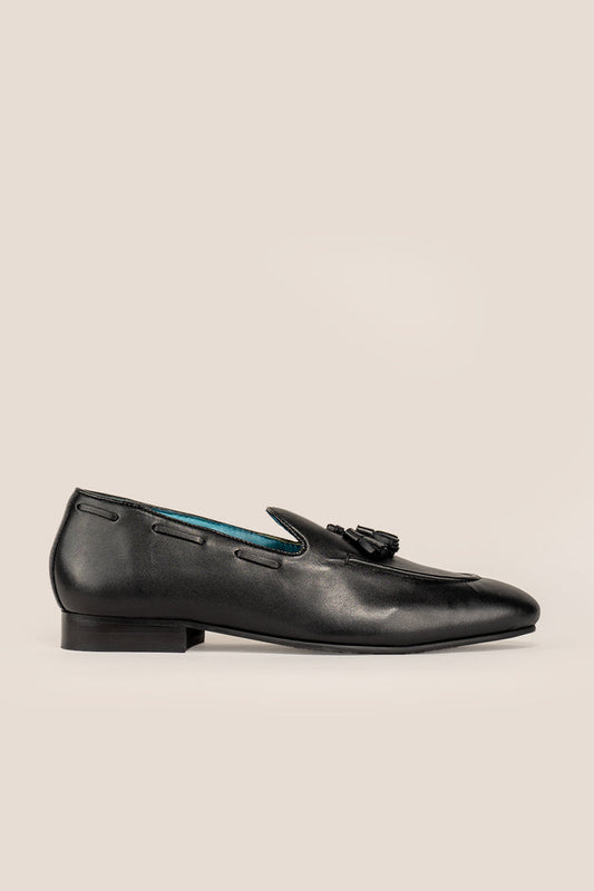 Alvin Black leather tassel loafers for men crafted from premium leather with classic tassel detail, ideal for formal and smart casual occasions.