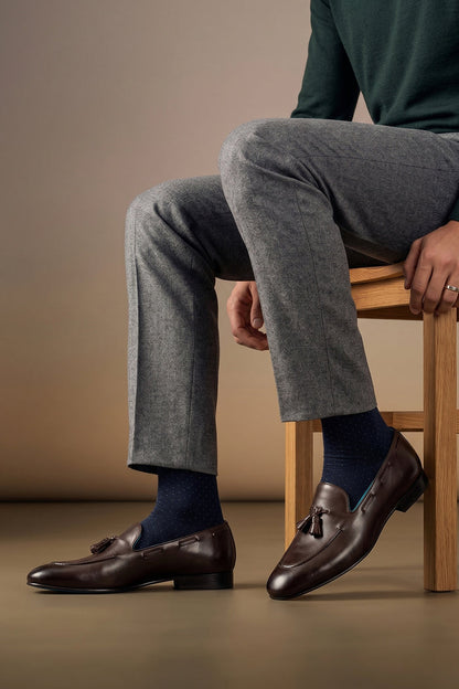 Man wearing Alvin Brown leather tassel loafers for men, crafted from premium leather with classic tassel detail, ideal for formal and smart casual occasions.