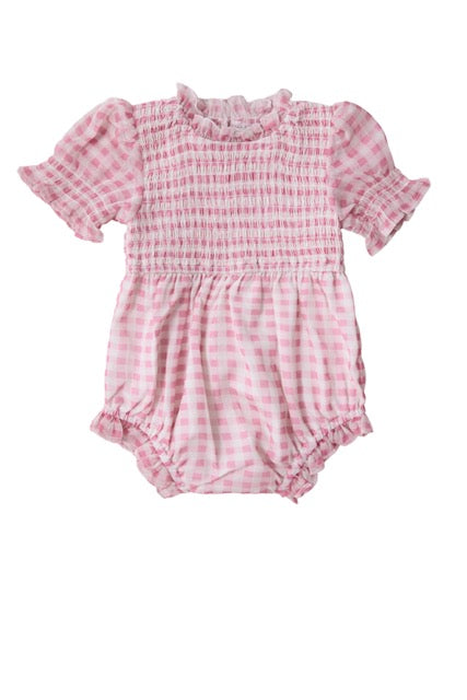 The Baby Cordelia Romper in Desert Rose Gingham by Ivy City Co is shown on a white background, featuring short puff sleeves, a smocked bodice, ruffled neckline, and elastic leg openings.