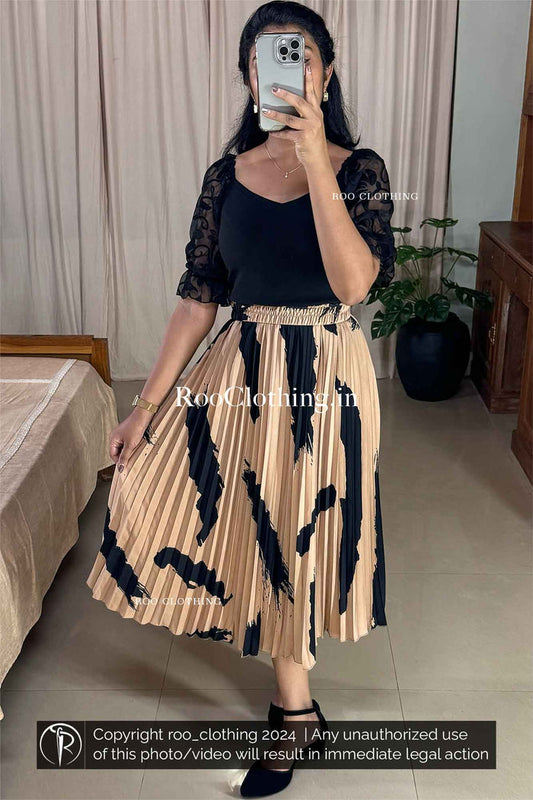 Beige Accordion Pleated Midi Skirt with Bold Abstract Black Print Skirt