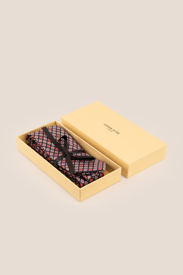 Blue Motif Print Silk Tie with geometric pattern, exuding luxury and sophistication for formal events.