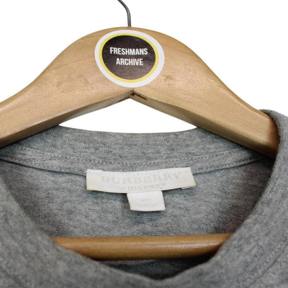 Burberry grey cotton pocket t-shirt with white logo print and short sleeves.