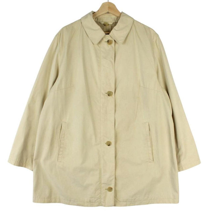 Burberry beige single breasted coat with logo detail and classic tailored design.