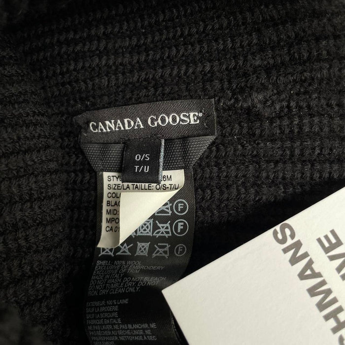 Canada Goose black beanie hat ribbed wool with embroidered logo detail.