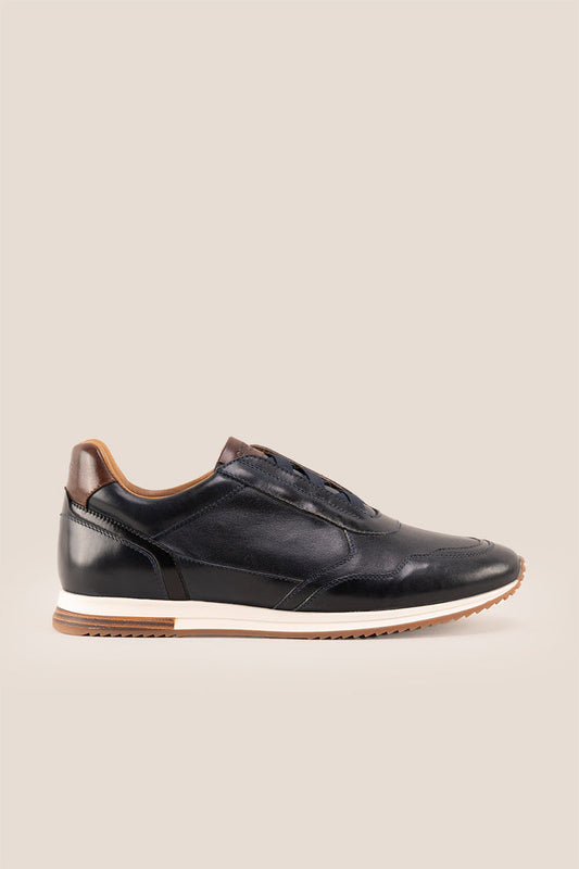 Colt Navy men's leather sneakers, featuring a clever elastic design that ensures a comfortable and secure fit.