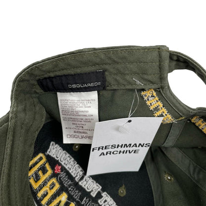 Dsquared2 khaki green baseball cap embroidered Fight For Freedom logo.