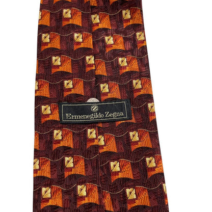 Ermenegildo Zegna brown and orange silk tie with abstract print design.