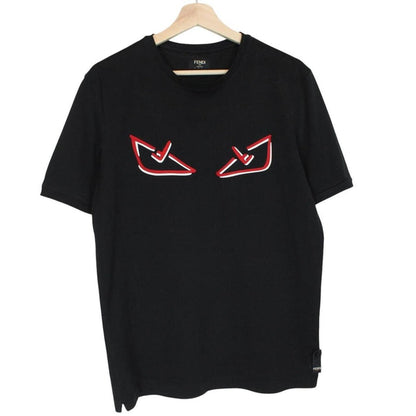 Fendi black cotton t-shirt with red Bag Bug eyes graphic and pocket detail.