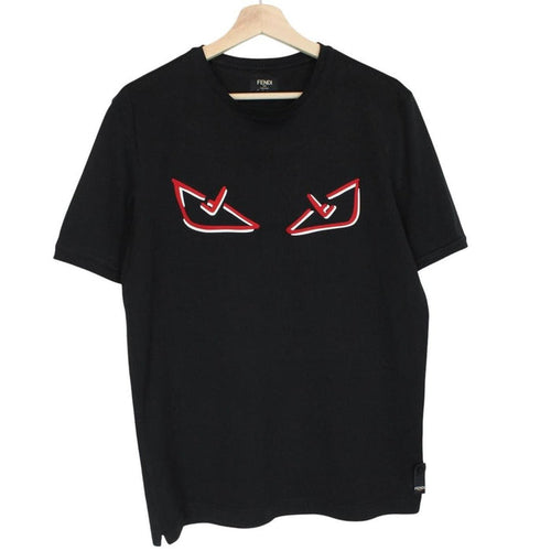 Fendi black cotton t-shirt with red Bag Bug eyes graphic and pocket detail.