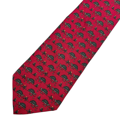Hermes green and red silk tie featuring turtle print design and logo.