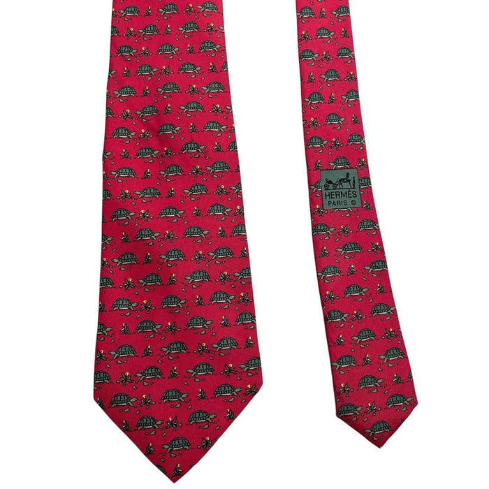 Hermes green and red silk tie featuring turtle print design and logo.