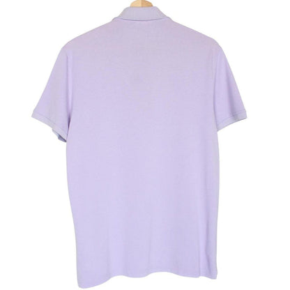 Lacoste lilac purple cotton polo shirt with embroidered crocodile logo and pocket.