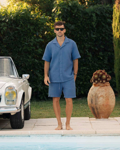Le Waffle Resort Shirt in azure — paired with matching waffle shorts by a pool