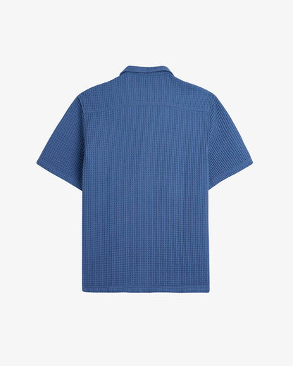 Le Waffle Resort Shirt in azure — back view showing the textured waffle-knit cotton