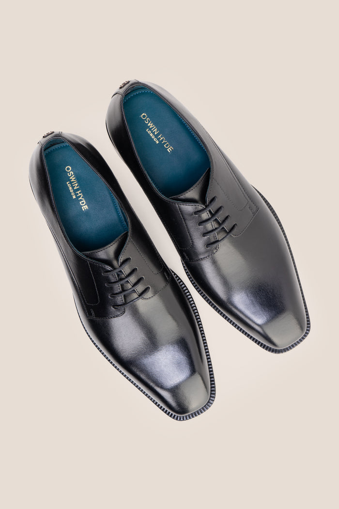The men's smart black shoes combine timeless elegance with open-lacing comfort, perfect for business tailoring and formal events.