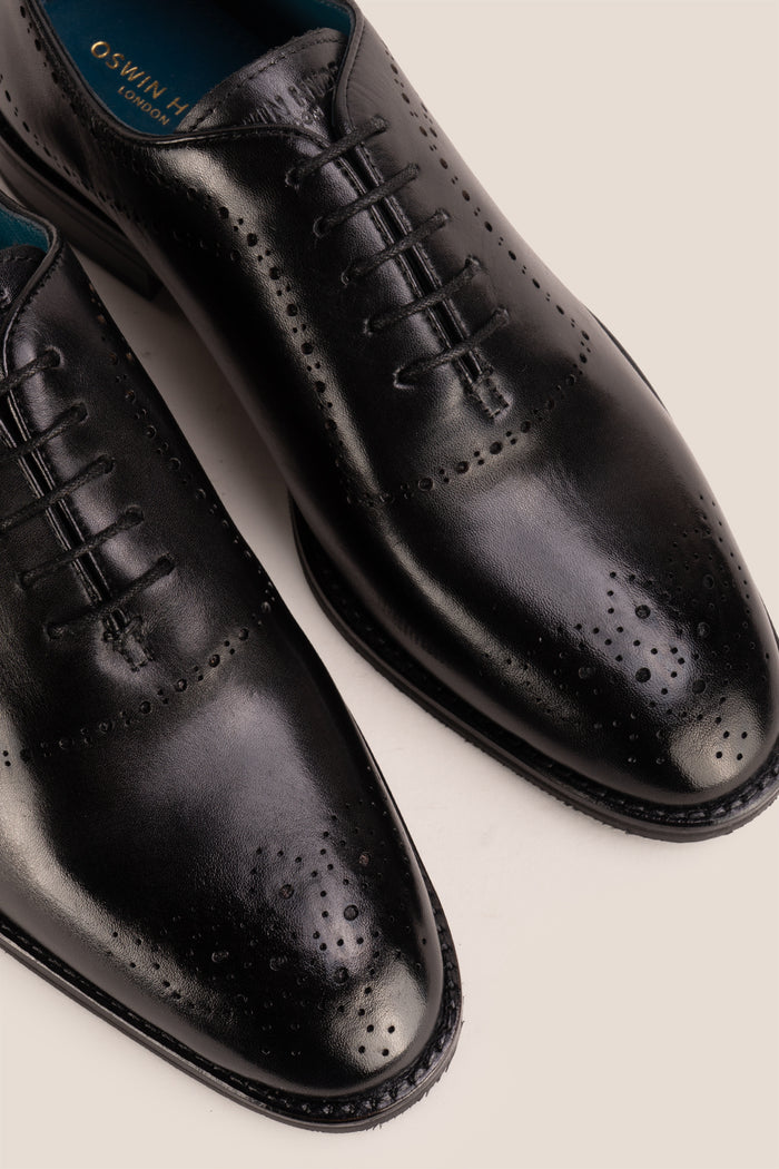 Melton Black Oxford men’s leather shoes with polished finish and classic design, ideal for formal and office occasions.