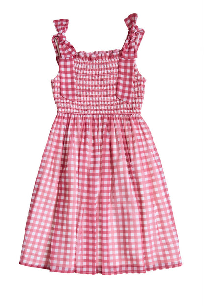 The Mini Rayna Dress in Red Gingham by Ivy City Co, a sleeveless smocked dress with ruffled straps, is shown laid flat on a white background—ideal for Mom and Me matching outfits.