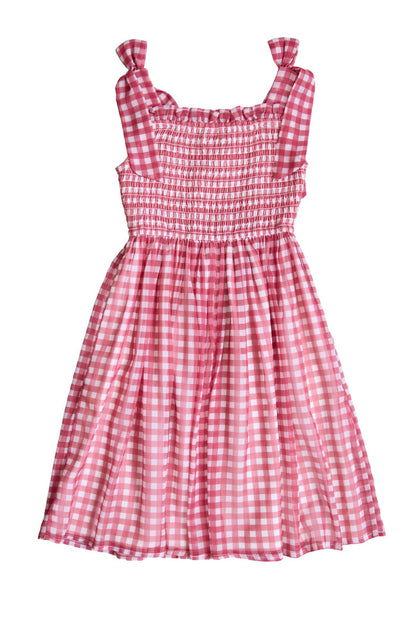 The Ivy City Co Mini Rayna Dress in Red Gingham features a smocked bodice, ruffled shoulder straps, and a gathered skirt—perfect for the Fourth of July—shown sleeveless and displayed flat on a white background.