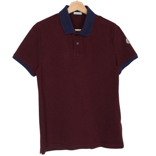 Moncler burgundy short sleeve polo shirt with logo detail and cotton material.