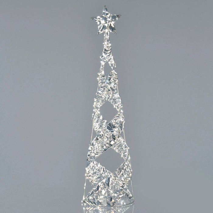 Silver foil spiral light up Christmas tree on grey background
