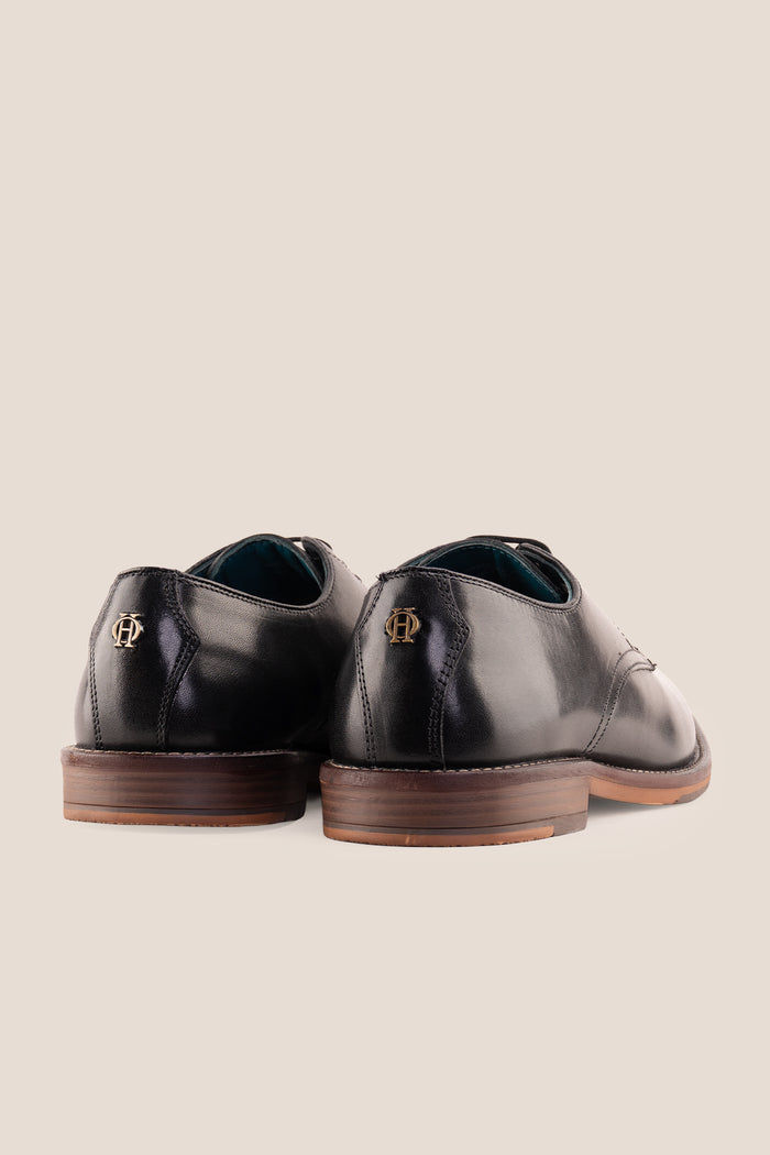 Nathan black leather Derby shoes for men featuring a 3-eyelet design, breathable lining, and durable leather sole for formal and smart casual occasions.