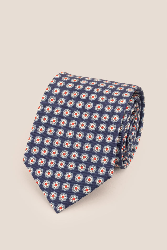 Navy Floral Print Silk Tie with elegant design, offering luxury and sophistication for formal occasions.