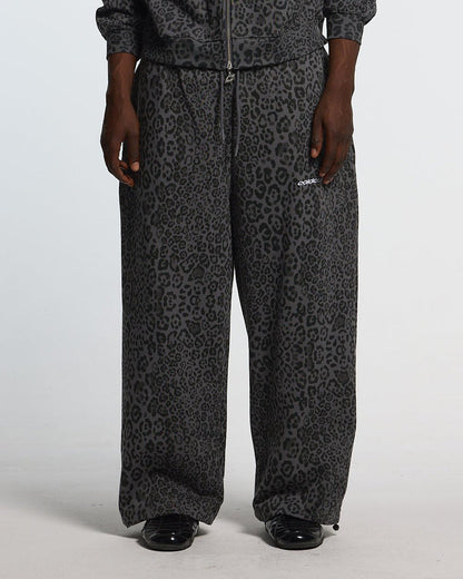 NOCTURNE BEAST SWEATPANTS DARK GREY - dark grey leopard print sweatpants, front view on male model - Cold Culture