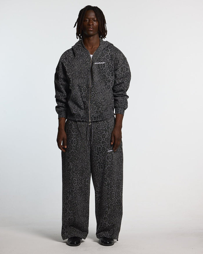 NOCTURNE BEAST SWEATPANTS DARK GREY - dark grey leopard print sweatpants, front view on male model - Cold Culture #man