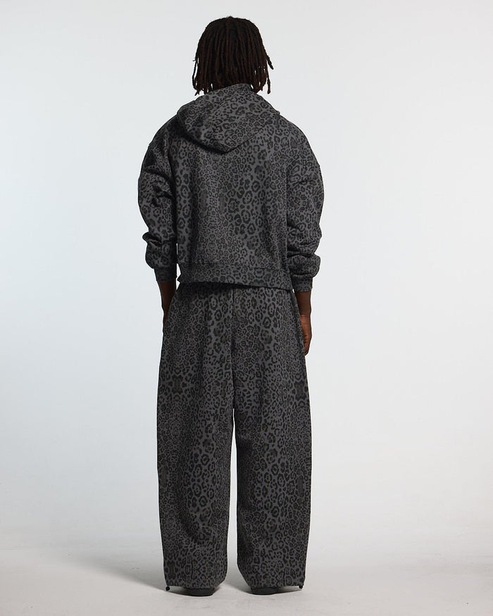 NOCTURNE BEAST SWEATPANTS DARK GREY - dark grey leopard print sweatpants, back view on male model - Cold Culture #man