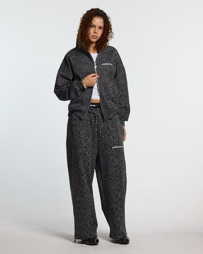 NOCTURNE BEAST SWEATPANTS DARK GREY - dark grey leopard print sweatpants, front view on female model - Cold Culture #woman