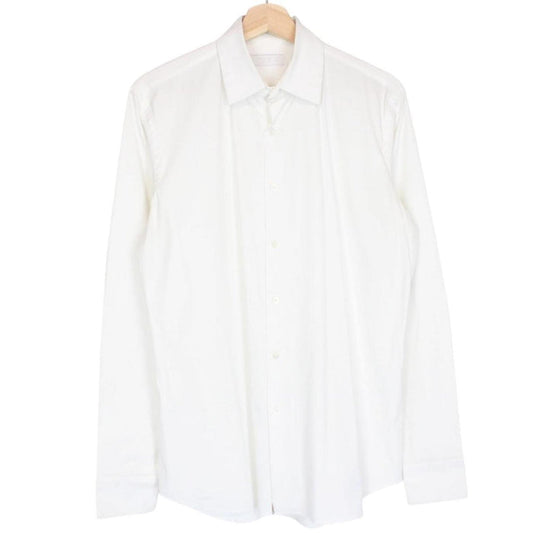 Prada white long sleeve shirt with popeline stretch fabric and cut care labels.