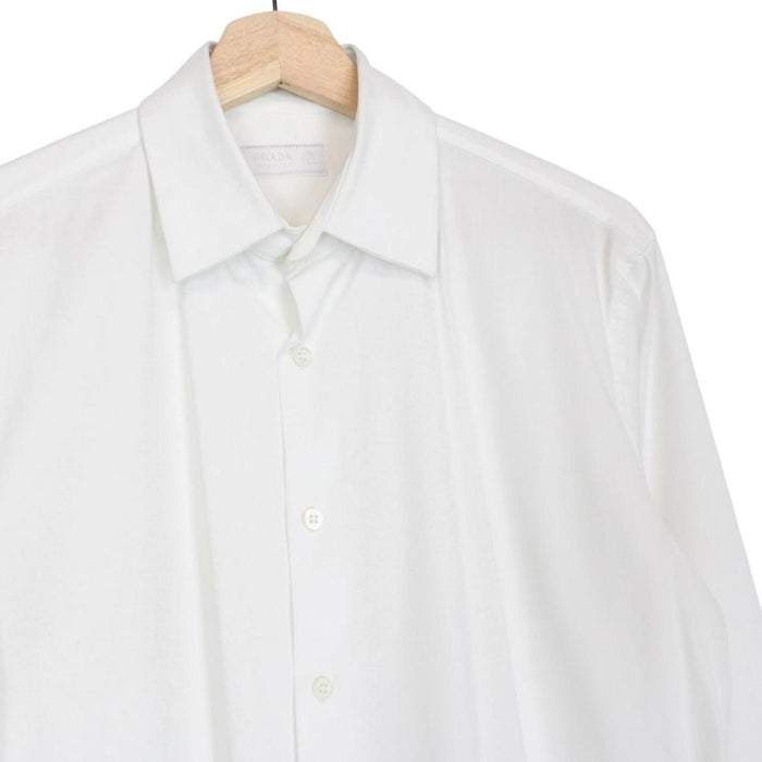 Prada white long sleeve shirt with popeline stretch fabric and cut care labels.