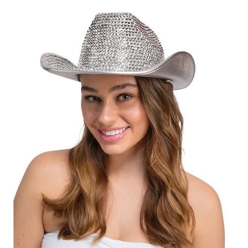 Lady wearing a silver cowboy hat covered in rhinestones