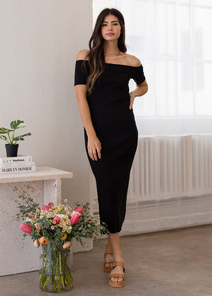 woman wearing off shoulder rib dress in black