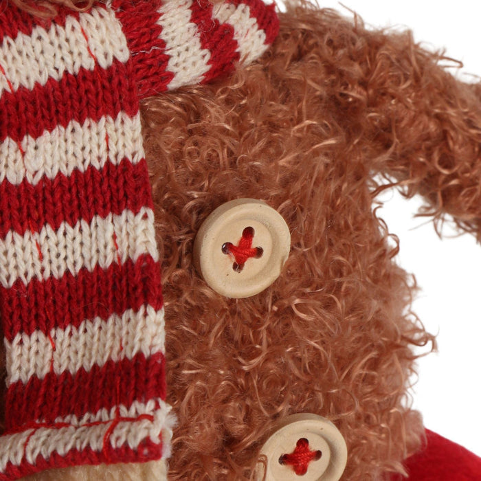 close up shot of wooden buttons on highland cow decoration