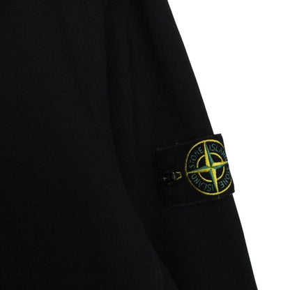 Stone Island black cotton sweatshirt with embroidered compass logo and ribbed cuffs.