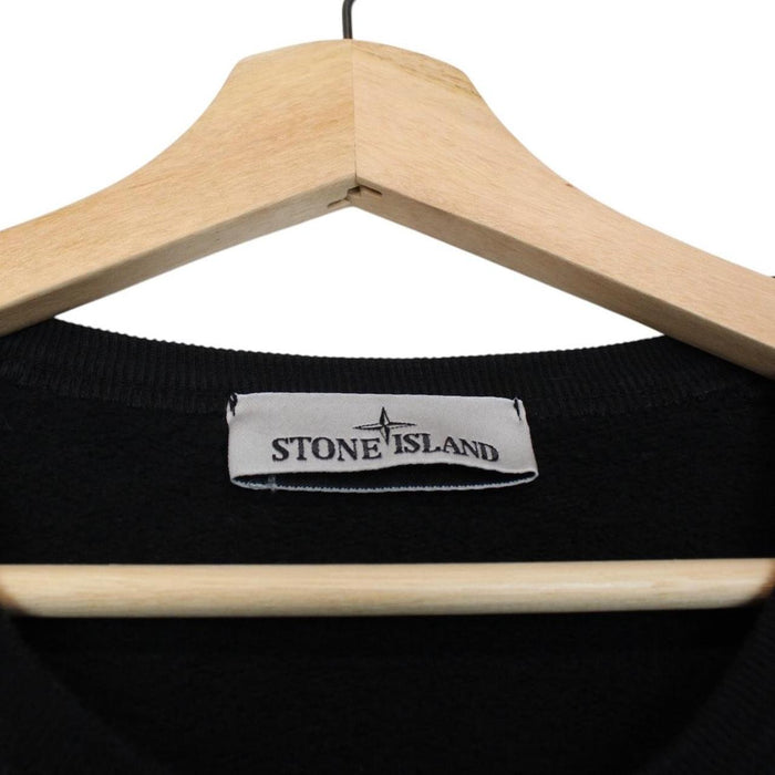 Stone Island black cotton sweatshirt with embroidered compass logo and ribbed cuffs.