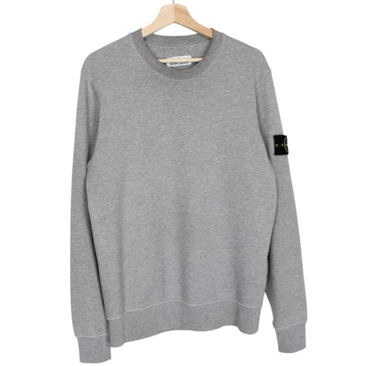 Stone Island grey cotton sweatshirt with logo patch and soft texture.