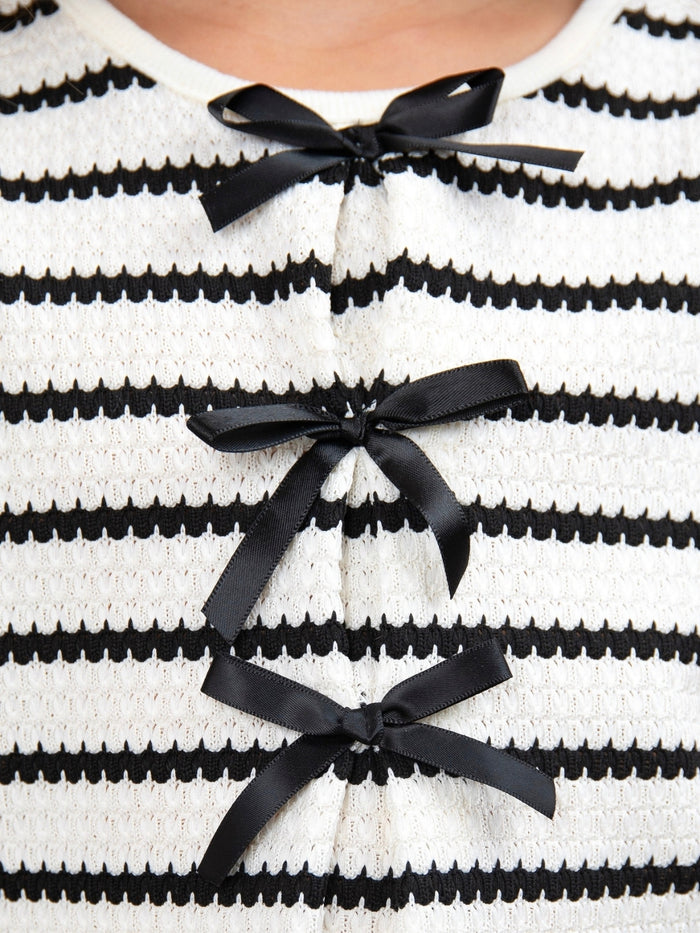 Cute girls matching waffle knit set with decorative bows