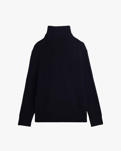 A back view of The Halfzip Sweater in black, laid flat on a white background. The image highlights the knit texture, the ribbed standing collar, cuffs, and hem of this c'est normal sweater.