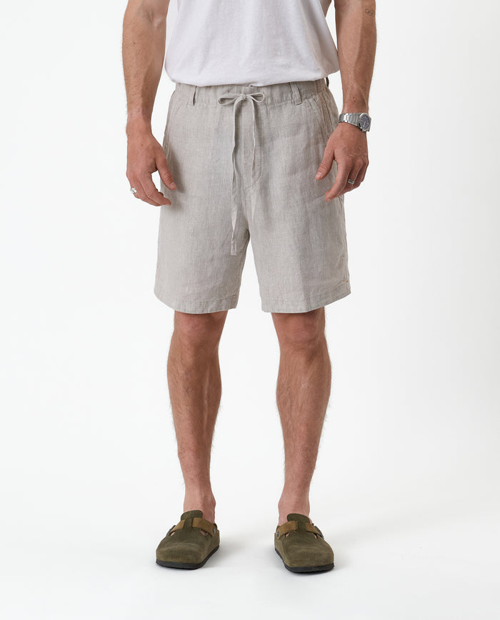 The Holiday Linen Short in natural — front view featuring a drawstring waist