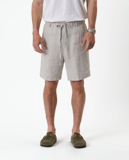 The Holiday Linen Short in natural — front view featuring a drawstring waist