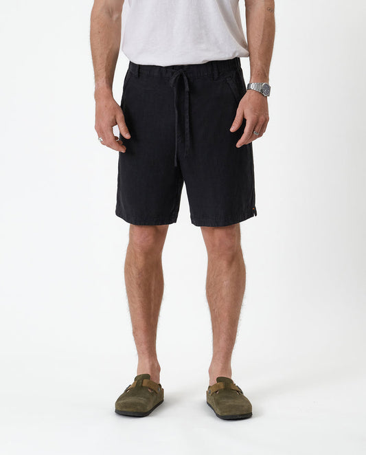 The Holiday Linen Short in black — front view against a white background