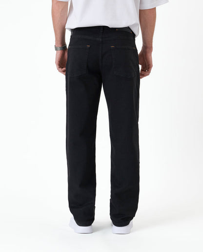 The Jeans Relaxed Straight Fit in Jet Black — back view showing the straight leg silhouette